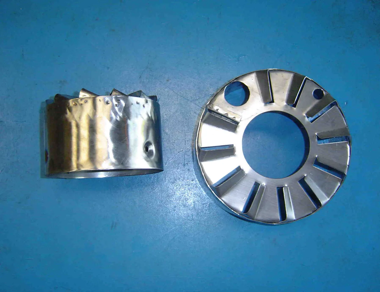 Precision-machined boiler burner and diffuser components supplied by D. B. Johnsen