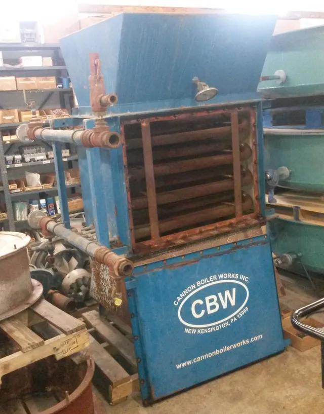 Cannon Boiler Works feedwater heater and economizer with its finned tube bundle exposed